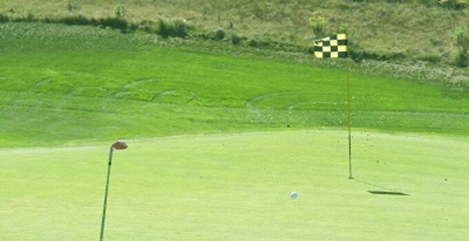 Man Hitting Golf Ball out of Bunker web400 Man Hitting Golf Ball out of Bunker